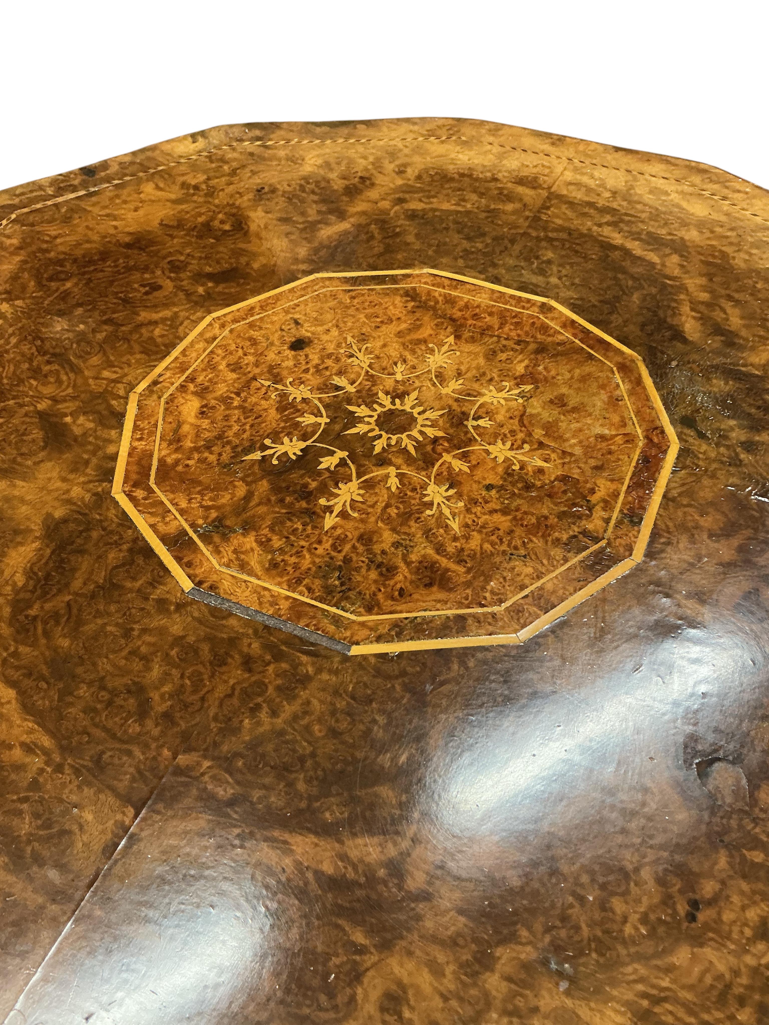 A Victorian octagonal walnut marquetry inlaid occasional table, width 58cm, height 63cm
